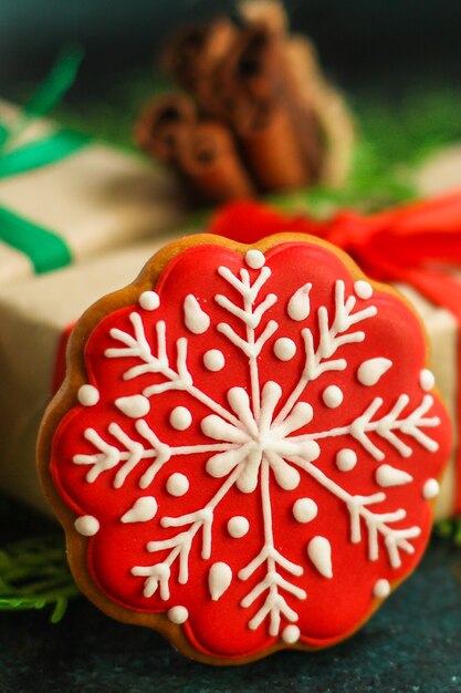 Christmas gingerbread cookie on blurred background 