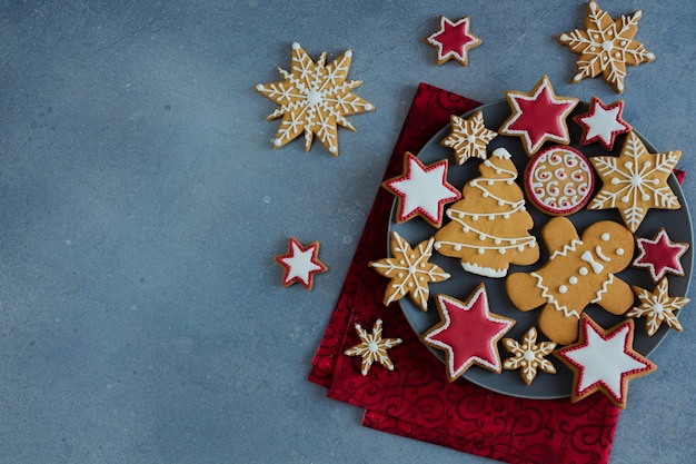 Christmas gingerbread cookies on plate.