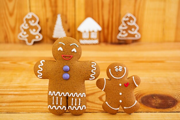 Christmas gingerbread cookies on wooden background