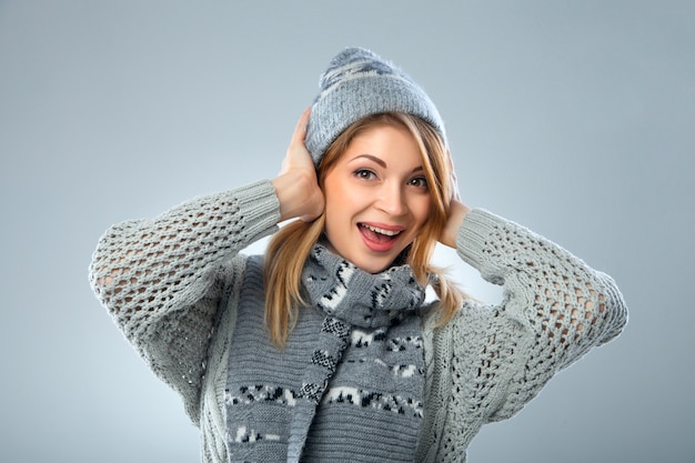 Christmas girl, young beautiful smiling over blue