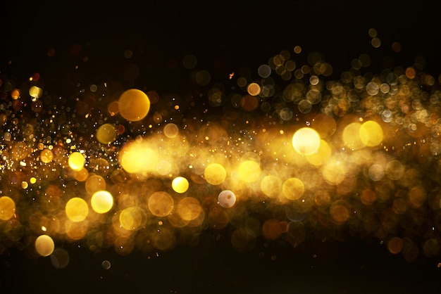 Photo christmas gold abstract defocused glowing effect