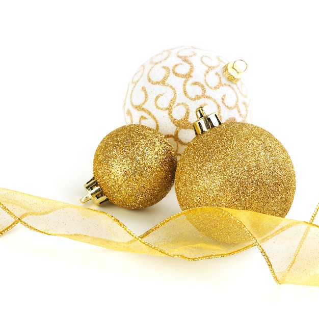 Christmas Gold Ribbon And Balls isolated on white