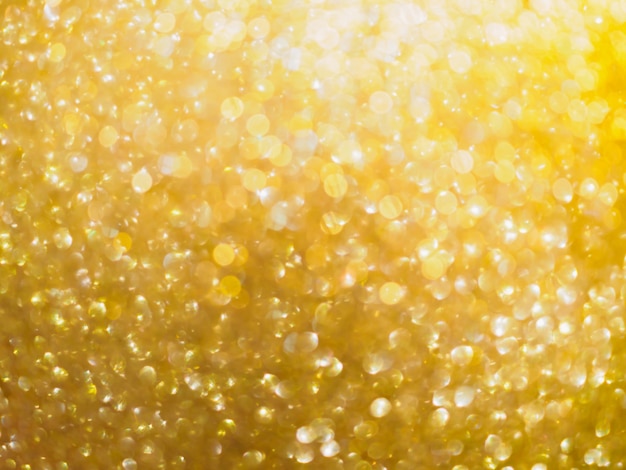 Christmas golden glow bokeh light blur abstract Background