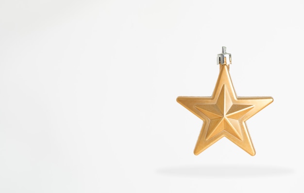 Christmas golden star on white background