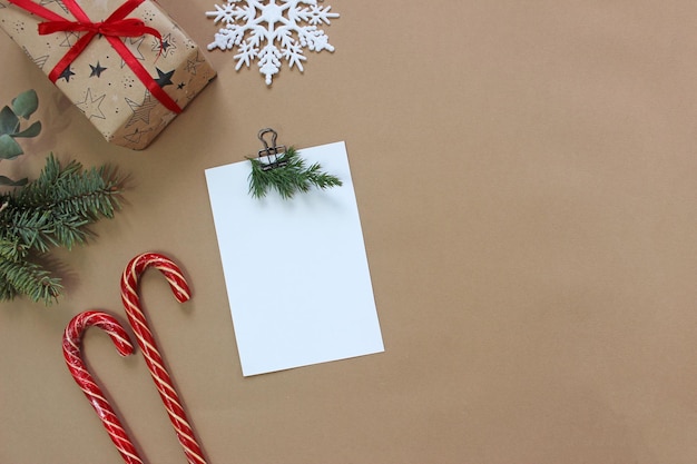 Christmas greeting card template. Empty paper mock up. New year flat lay, top view, copy space