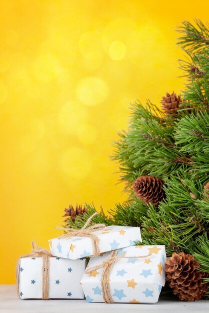 Christmas greeting card with fir tree and gifts