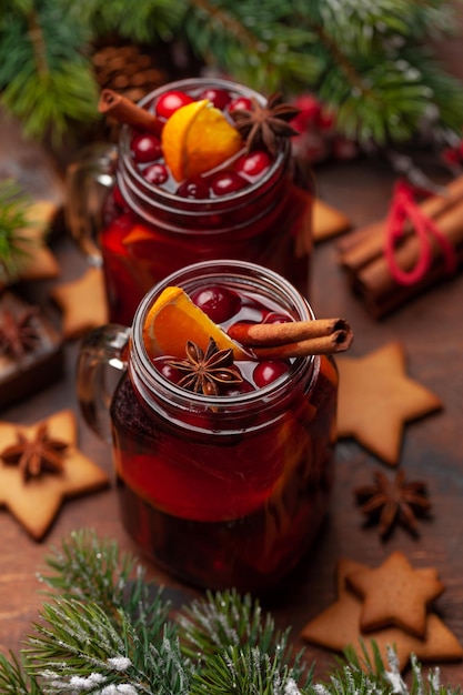 Christmas greeting card with mulled wine gingerbread cookies and xmas tree