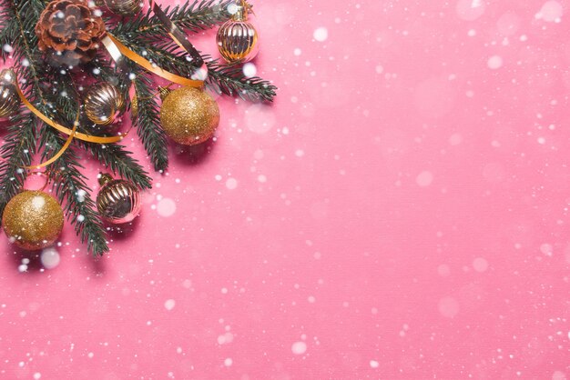 Photo christmas holiday composition on a pink background with place for text