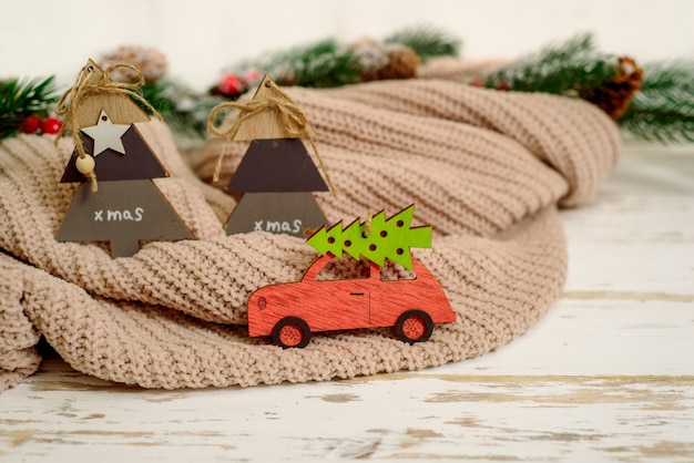 Christmas holiday concept with pine tree on toy car.