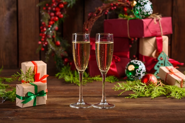 Christmas holiday table with glasses and a bottle 