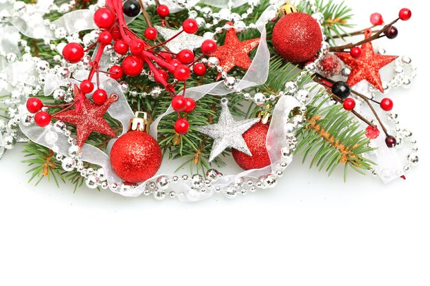 Christmas holiday with red ball, bauble, ribbon and stars isolated