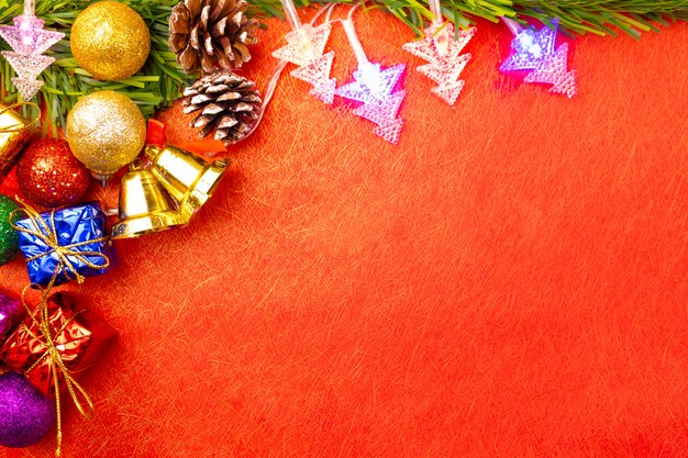 Christmas holidays decoration composition and stuff on red background. 