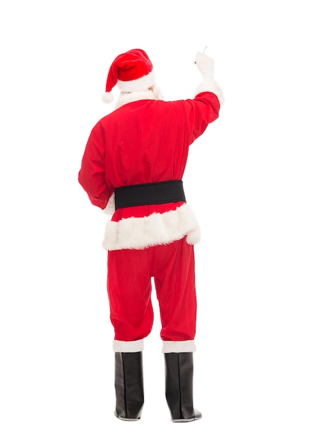 크리스마스, 휴일 및 사람들 개념 - 뒤에서 무언가를 쓰는 산타 클로스 의상을 입은 남자