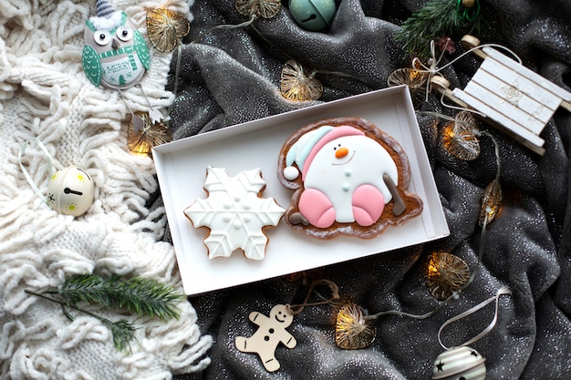 Christmas homemade gingerbread cookies and Christmas decorations, Cozy festive atmosphere
