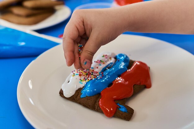 Christmas homemade gingerbread cookies on wooden table.