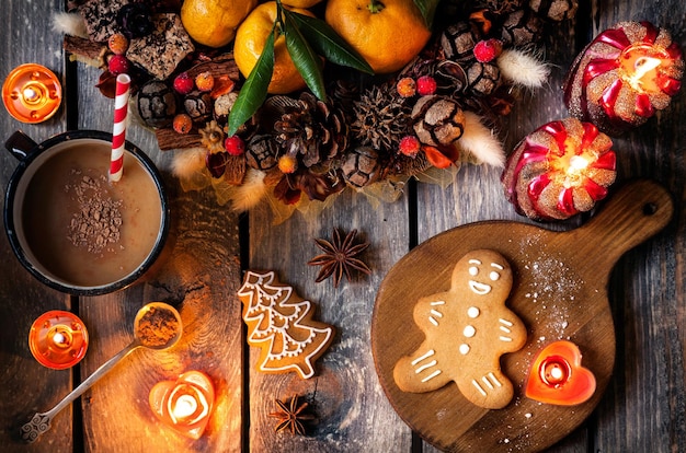 Christmas homemade gingerbread cookies on wooden table