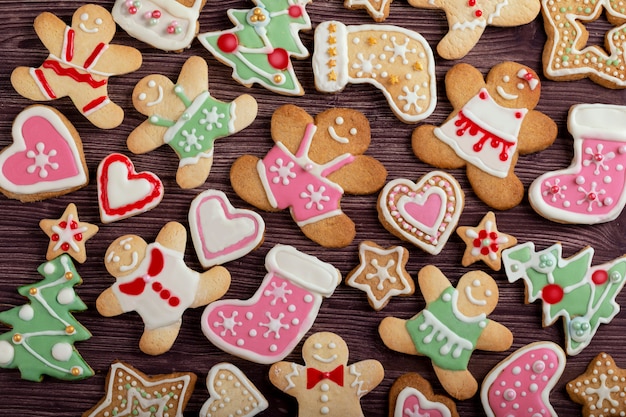 Christmas homemade gingerbread cookies on wooden table 