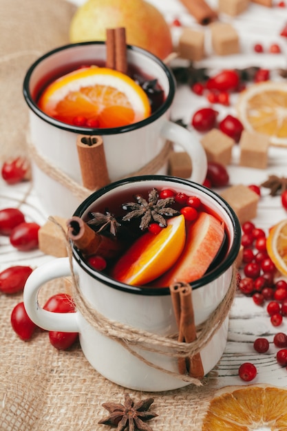 christmas hot mulled wine in rustic cup close up