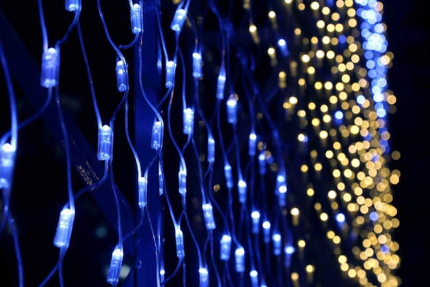 Christmas illumination color, with garlands in the form of a wall