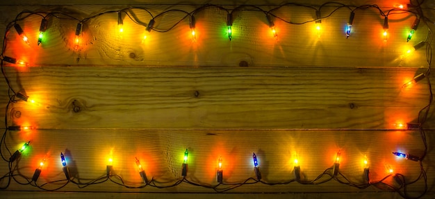 Christmas lights frame background. 