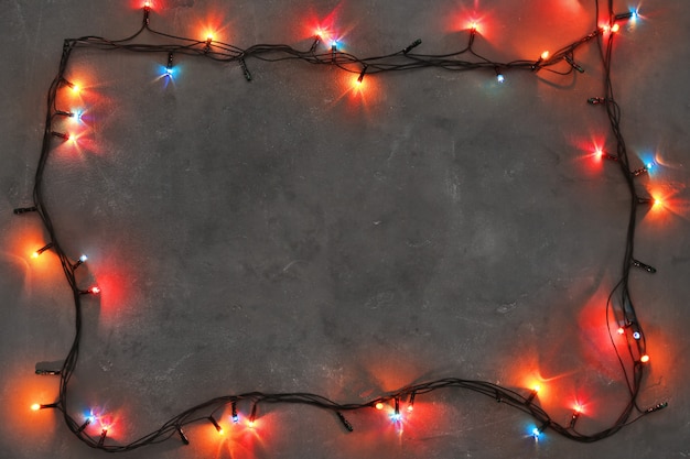 christmas lights glowing on dark background