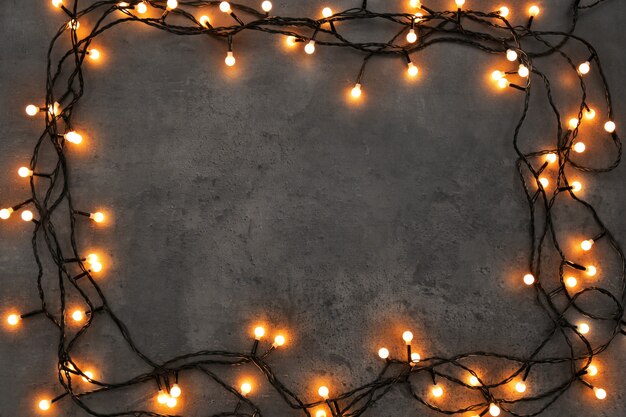 christmas lights glowing on dark background