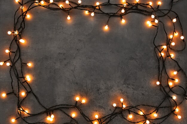 Christmas lights glowing on dark background