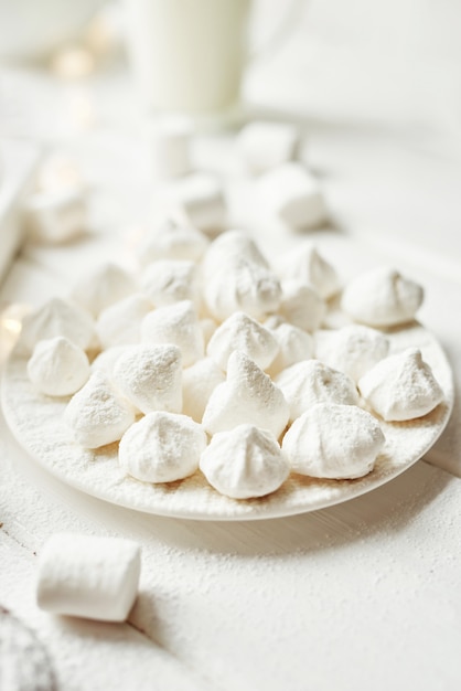 christmas meringue with marshmallows by the window