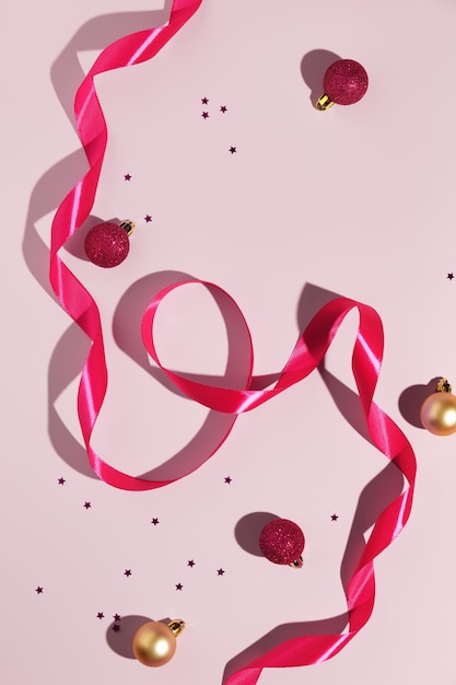 Christmas minimalistic composition on pink background Mockup for cosmetic