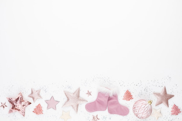 Christmas minimalistic and simple composition in pink color.