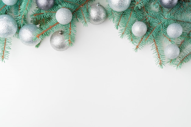 Christmas mock up with pine branches on white , copyspace, flatlay