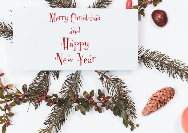 Christmas mockup for postcard with dry fruits, craft paper, gift box, handmade christmas toys