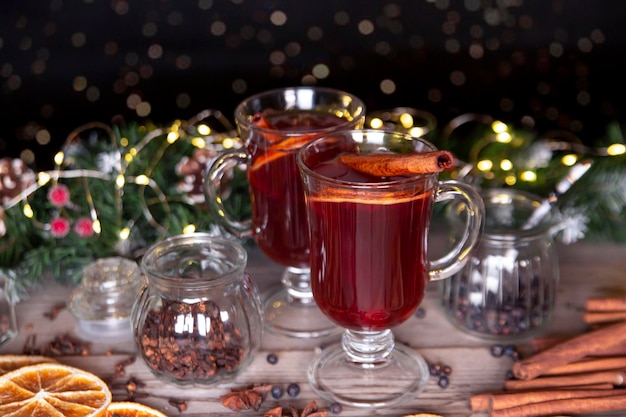 Christmas mood holiday atmosphere Mulled wine in glassware on a wooden table