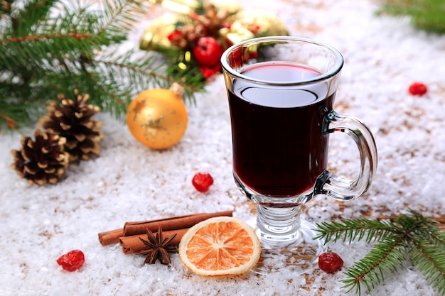 Christmas mulled wine and ingridenty in the snow