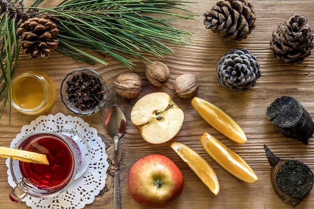 Christmas Mulled wine with spices on wooden background