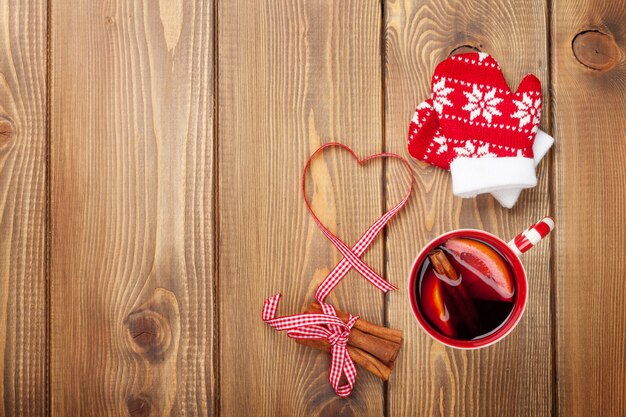 Christmas mulled wine on wooden table. View from above with copy space