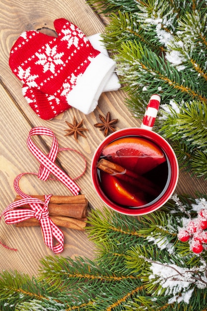 Christmas mulled wine on wooden table