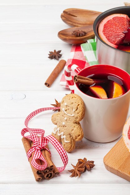 Christmas mulled wine on wooden table