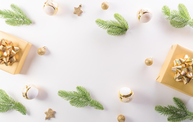 Christmas and new year background concept. Top view of Christmas gift box, reindeer, christmas ball and snowflake on white background.