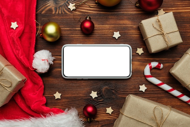 Christmas and new year concept with smartphone