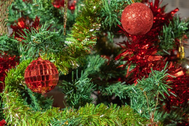 Christmas and New Year Decoration Baubles hanging on Christmas Tree