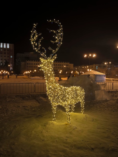 Christmas and New Year decoration in the city at night Festive background