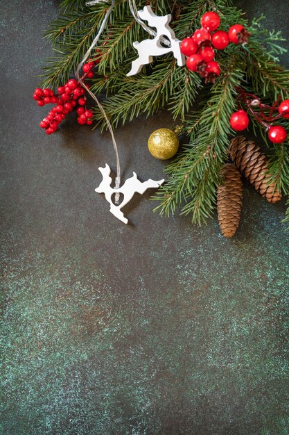 Christmas or New Year flat lay with fir tree branch and Christmas decorations Holiday concept