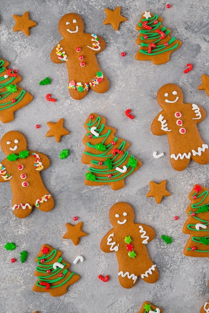 Christmas or New Year food background Gingerbread cookies decorated with sugar glaze top view