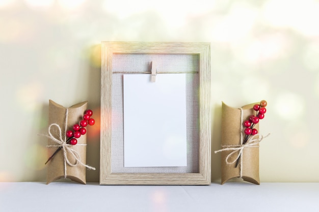 Christmas, New Year frame mockup template with Christmas packed gifts.