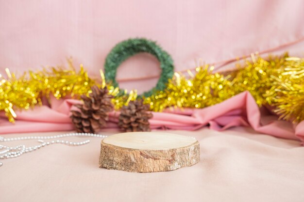 Christmas and New Year's Minimalist Concept. The composition displays the product. displaying products on wood with christmas and new year decorations