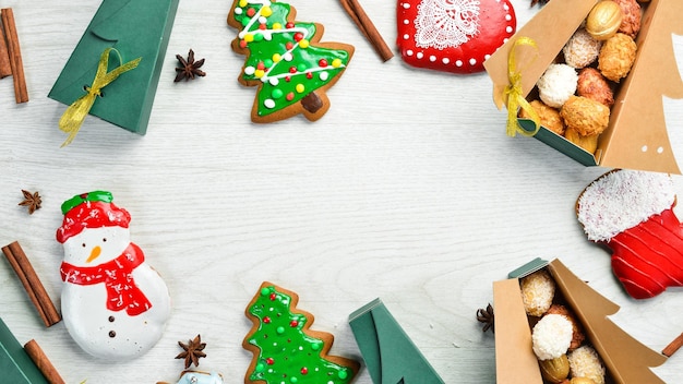 Christmas and New Year sweets Sweets gingerbread and candies Banner Top view Sweet bar