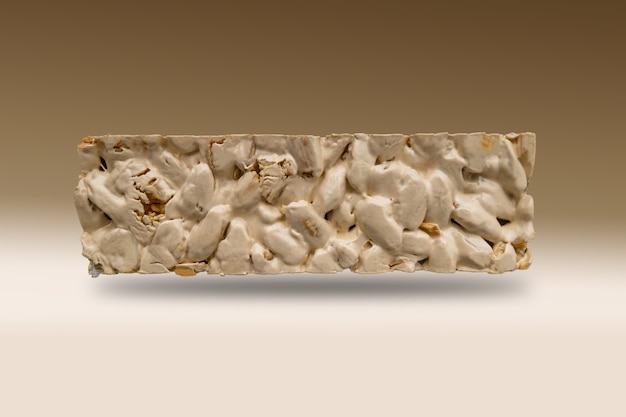 Christmas nougat view on brown gradient background..