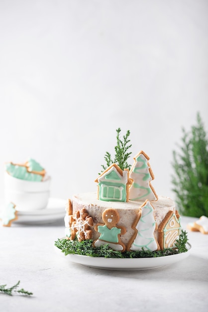 Christmas nude cake with white cream and christmas decoration, selective focus image