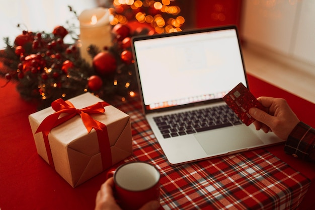 Christmas online shopping with laptop